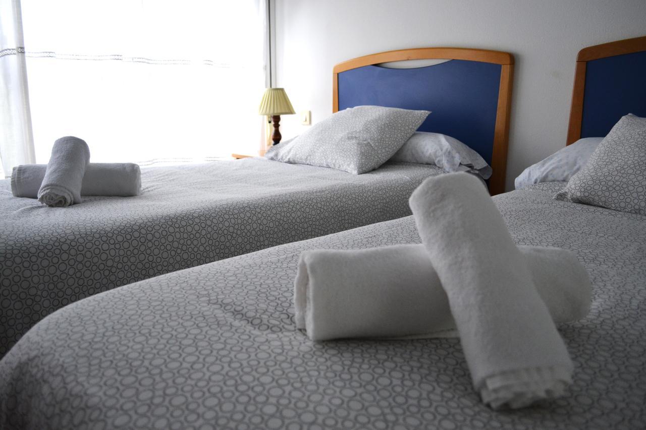 לוגו Hostal Lucus מראה חיצוני תמונה