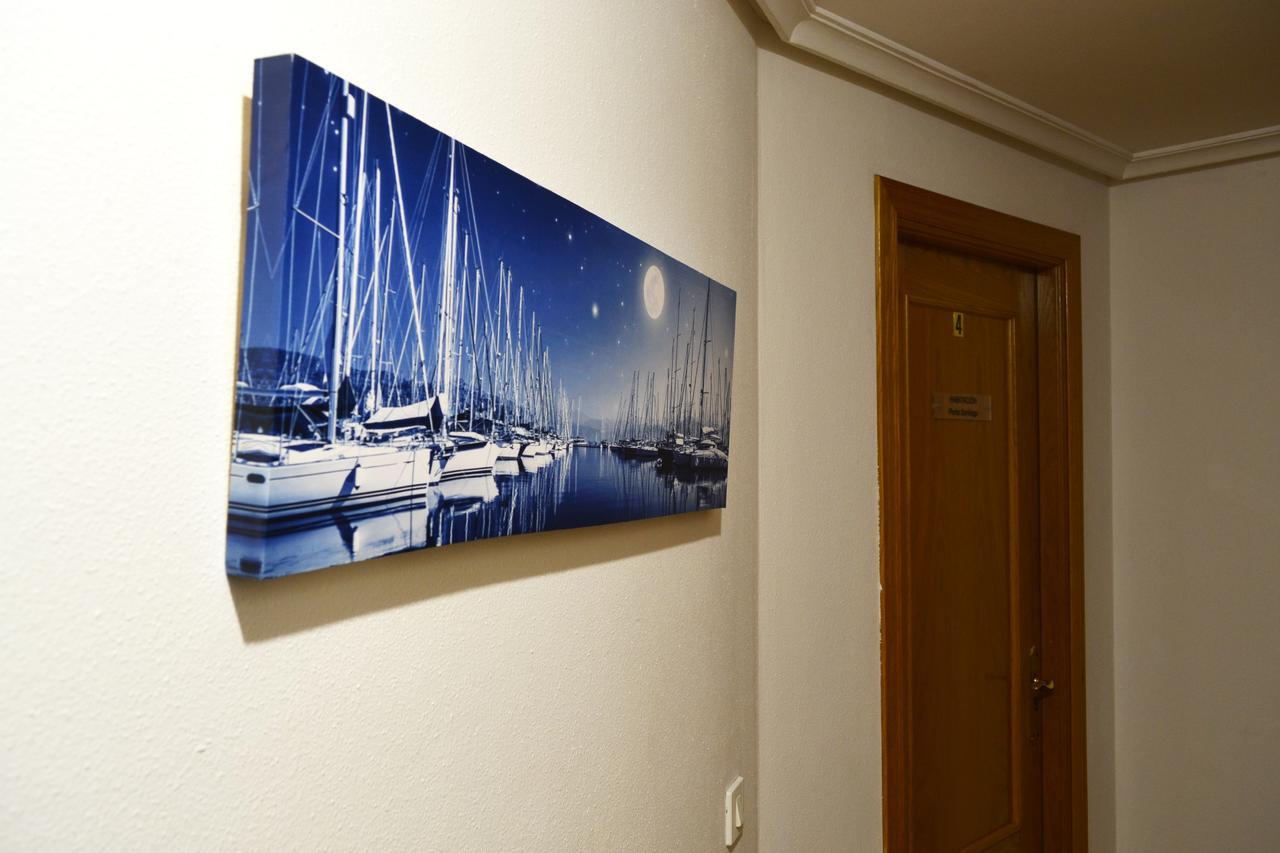 לוגו Hostal Lucus מראה חיצוני תמונה