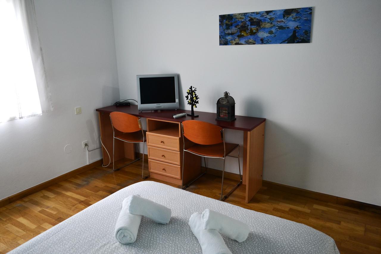 לוגו Hostal Lucus מראה חיצוני תמונה