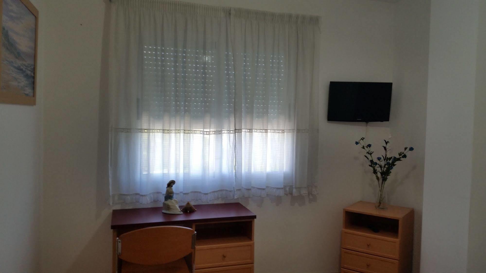 לוגו Hostal Lucus מראה חיצוני תמונה